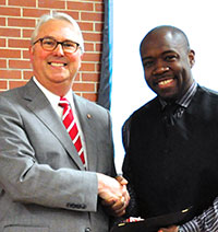 Thomas Easley of CNR receiving award from Chancellor Woodson