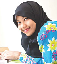 young smiling woman in hijab