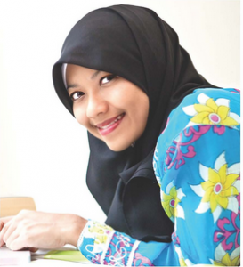 Young, smiling woman in hijab